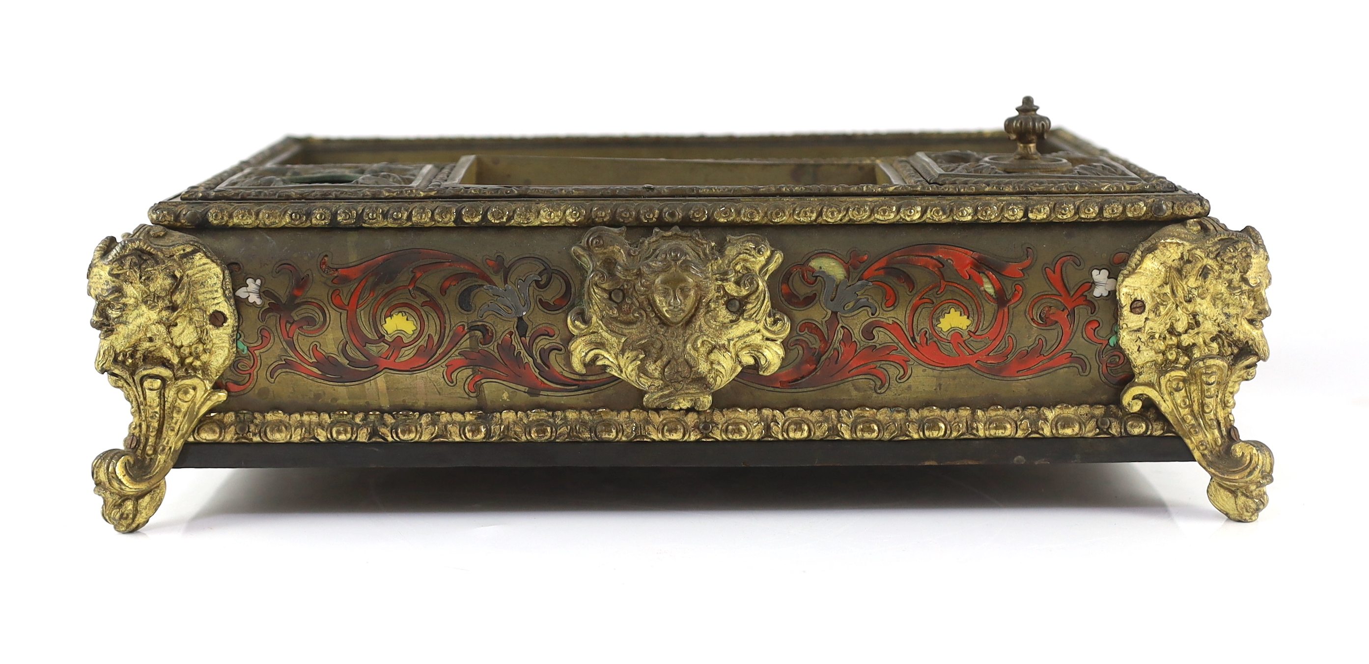 A 19th century French scarlet Boulle work desk stand with ormolu mounts, 36cm wide